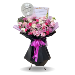 Standing flower selamat sukses Nalea Florist VARELIA 01 dengan rangkaian bunga segar