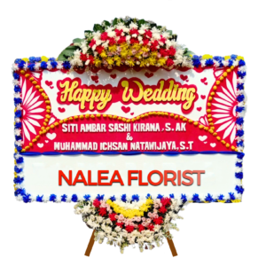 Karangan bunga papan Happy Wedding MAGDALENA 27 dengan rangkaian bunga segar