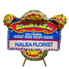 Karangan bunga papan selamat sukses Nalea Florist ULYSSA 21 dengan rangkaian bunga segar