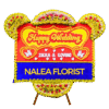 Karangan bunga papan Happy Wedding Nalea Florist FLORENCIA 31 dengan rangkaian bunga segar